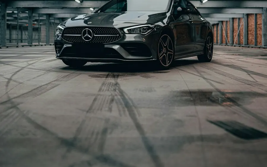 Dark grey Mercedes saloon